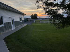 View of yard at dusk