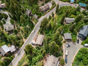 Aerial view of property's location with nearby suburban area
