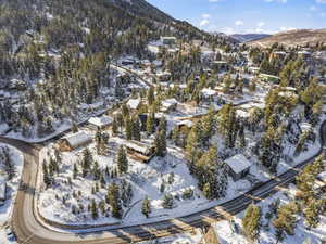 Snowy aerial view with a mountain view