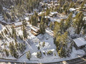 Snowy aerial view with a residential view