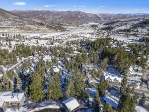 Snowy aerial view with a mountain view