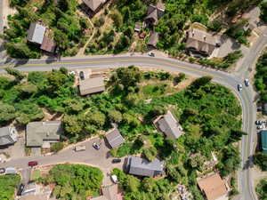 Aerial view of property's location featuring nearby suburban area