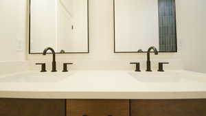 Full bathroom with double vanity