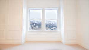 Detailed view of a decorative wall and carpet flooring