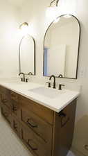 Bathroom featuring double vanity