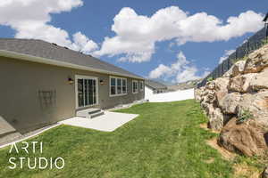 View of yard with a patio
