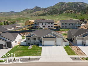 View of mountain background featuring nearby suburban area