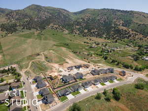View of property location with nearby suburban area and a mountainous background