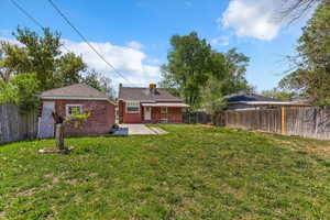 View of yard with a patio