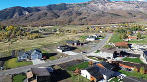 Aerial overview of property's location featuring nearby suburban area