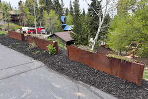 Steel planters: Engineered to modernize landscape, safeguard vehicles, and elevate curb appeal.