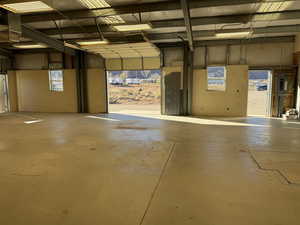 Miscellaneous room with a garage and electric panel