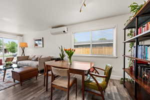 Dining room with a wall mounted AC & heating