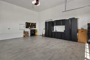 Garage featuring a garage door opener