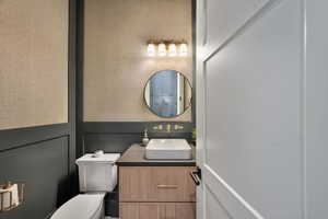 Half bath with toilet and vanity