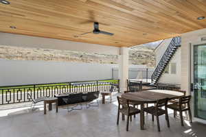 View of patio with outdoor dining area and outdoor lounge area