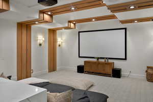 Home theater with carpet, baseboards, and recessed lighting