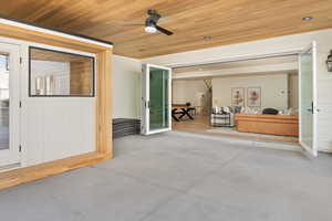 View of patio featuring a ceiling fan