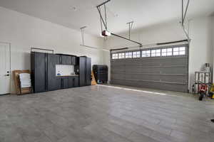 Garage featuring a garage door opener
