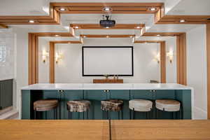 Home theater room with baseboards