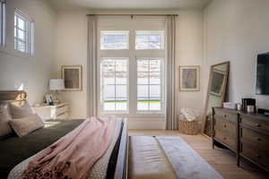 Bedroom with light wood-style flooring