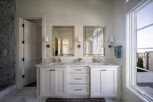 Full bathroom with double vanity