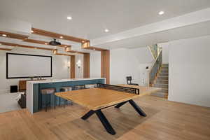 Game room featuring light wood-style flooring, recessed lighting, and baseboards