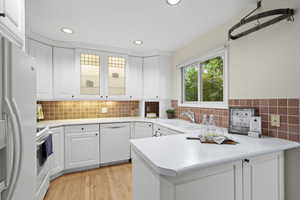 Custom glass and white cabinets