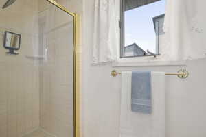 Primary suite shower and toilet in separate room