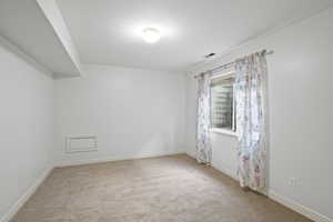 Basement bedroom (1) with new carpet