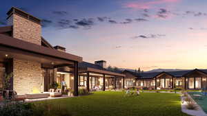 Yard at dusk featuring a patio area and a yard