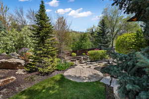 Enjoy a quiet evening around the fire with the soothing sound of the waterfall