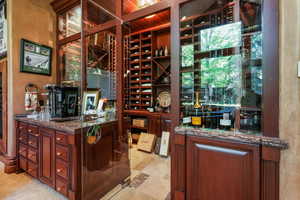 Wine area with wood ceiling
