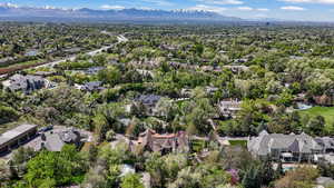 Aerial view of residential area with a mountainous background