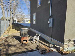 View of patio with fence