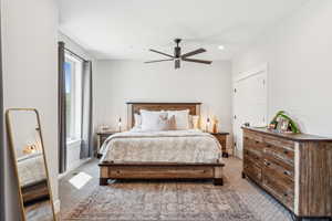 Bedroom featuring light carpet and recessed lighting