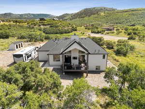 View of subject property featuring mountains