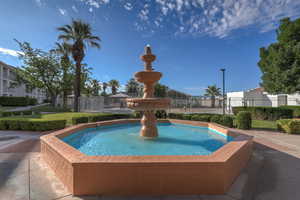 View of swimming pool with fence