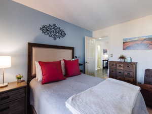 Bedroom with wood finished floors