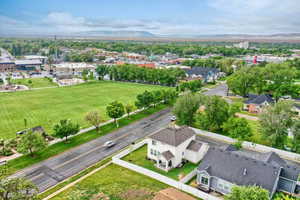 Aerial view of residential area featuring a mountain backdrop