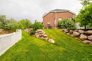 View of yard featuring central AC