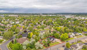 Aerial view of residential area with property parcel outlined