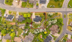 Aerial perspective of suburban area with property parcel outlined