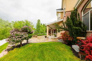 View of yard featuring a patio area