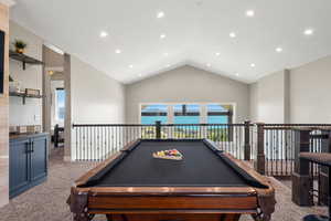 Game room with carpet, high vaulted ceiling, recessed lighting, and billiards