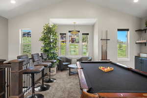 Game room featuring lofted ceiling, recessed lighting, and billiards table