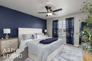 Carpeted bedroom with ceiling fan and baseboards