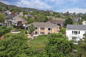 Aerial view of residential area with a mountain backdrop