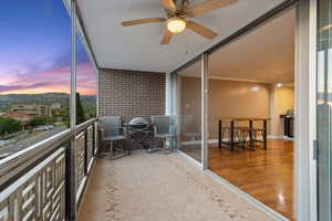 Balcony featuring a ceiling fan
