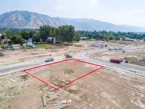 Aerial view of property's location with property boundaries highlighted and mountains
